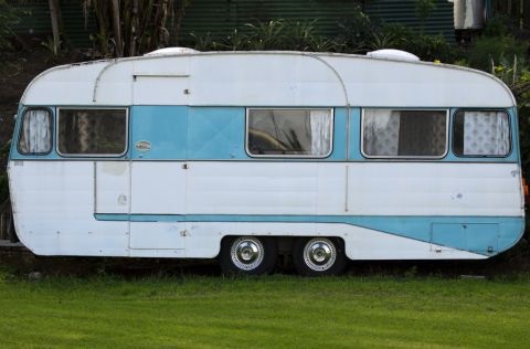 Caravan parked on grass 