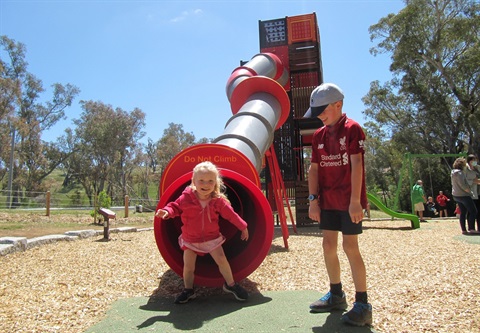 New playground at Harcourt with kids playing 
