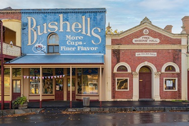 A building with a painted-on Bushells Sign in Maldon