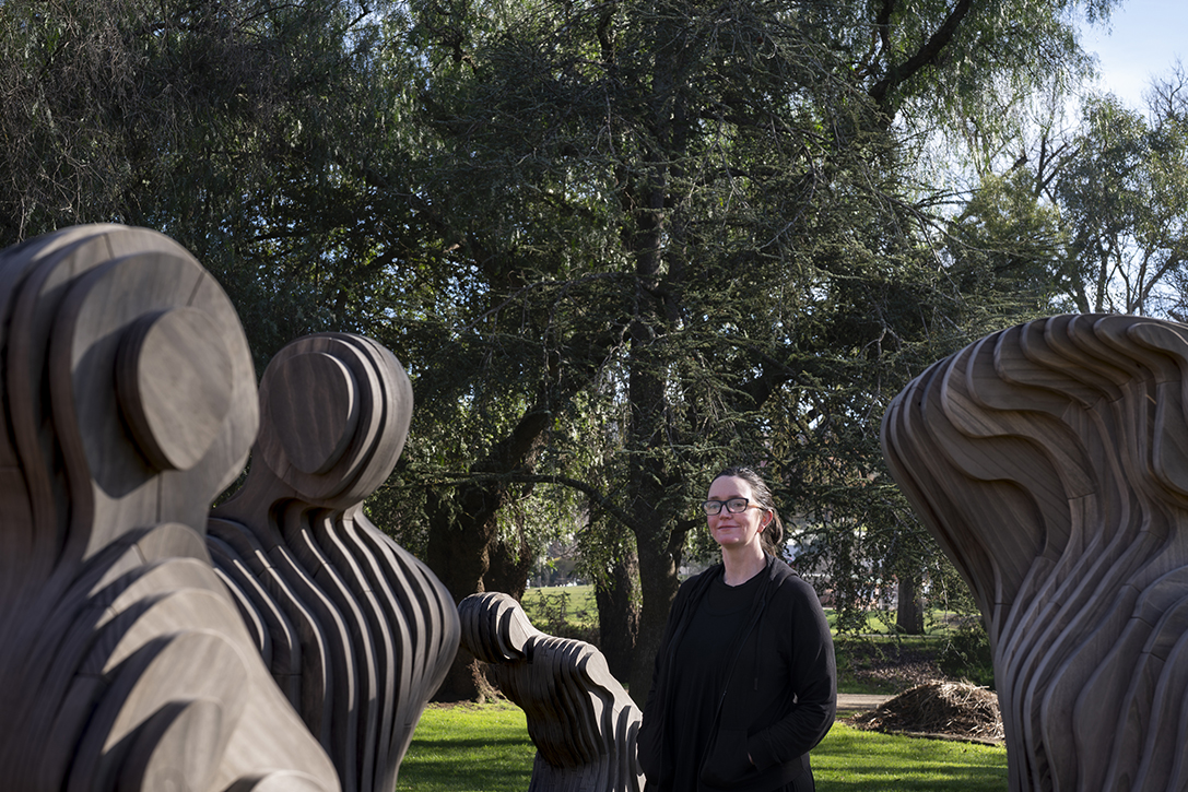 Artist Laura Woodward with Wildflowers sculptures
